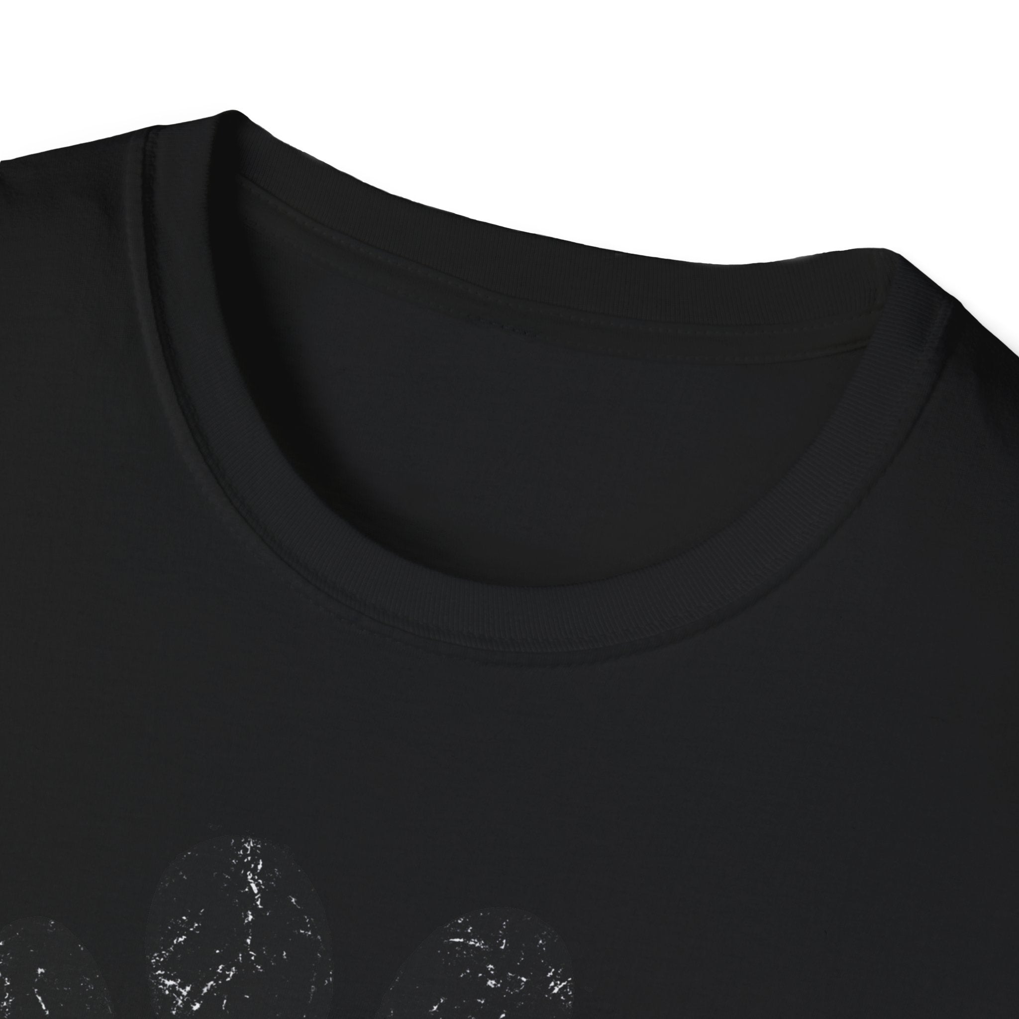 Close-up of a black t-shirt with a graphic design on a white background