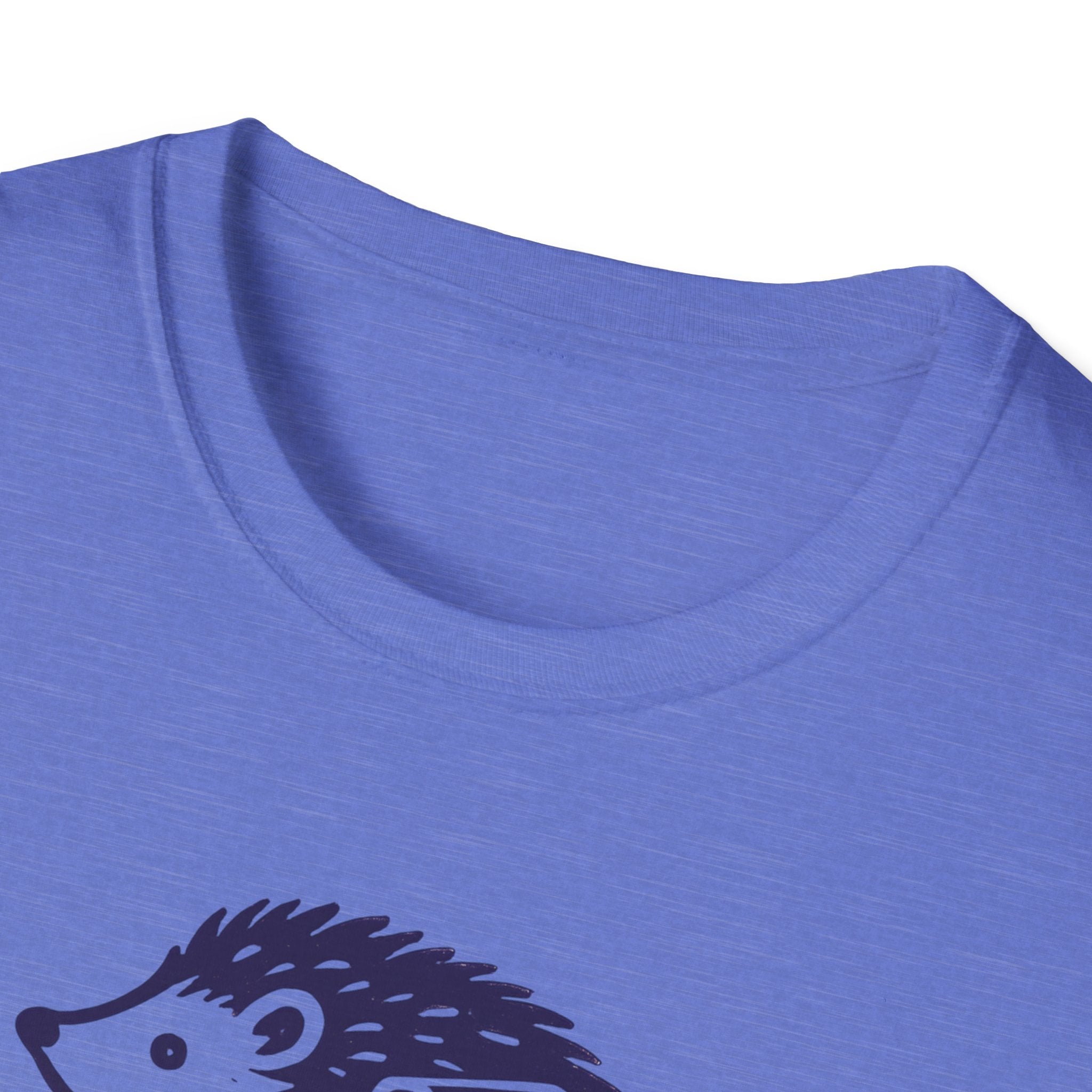 Close-up of a blue t-shirt with a hedgehog design on a white background