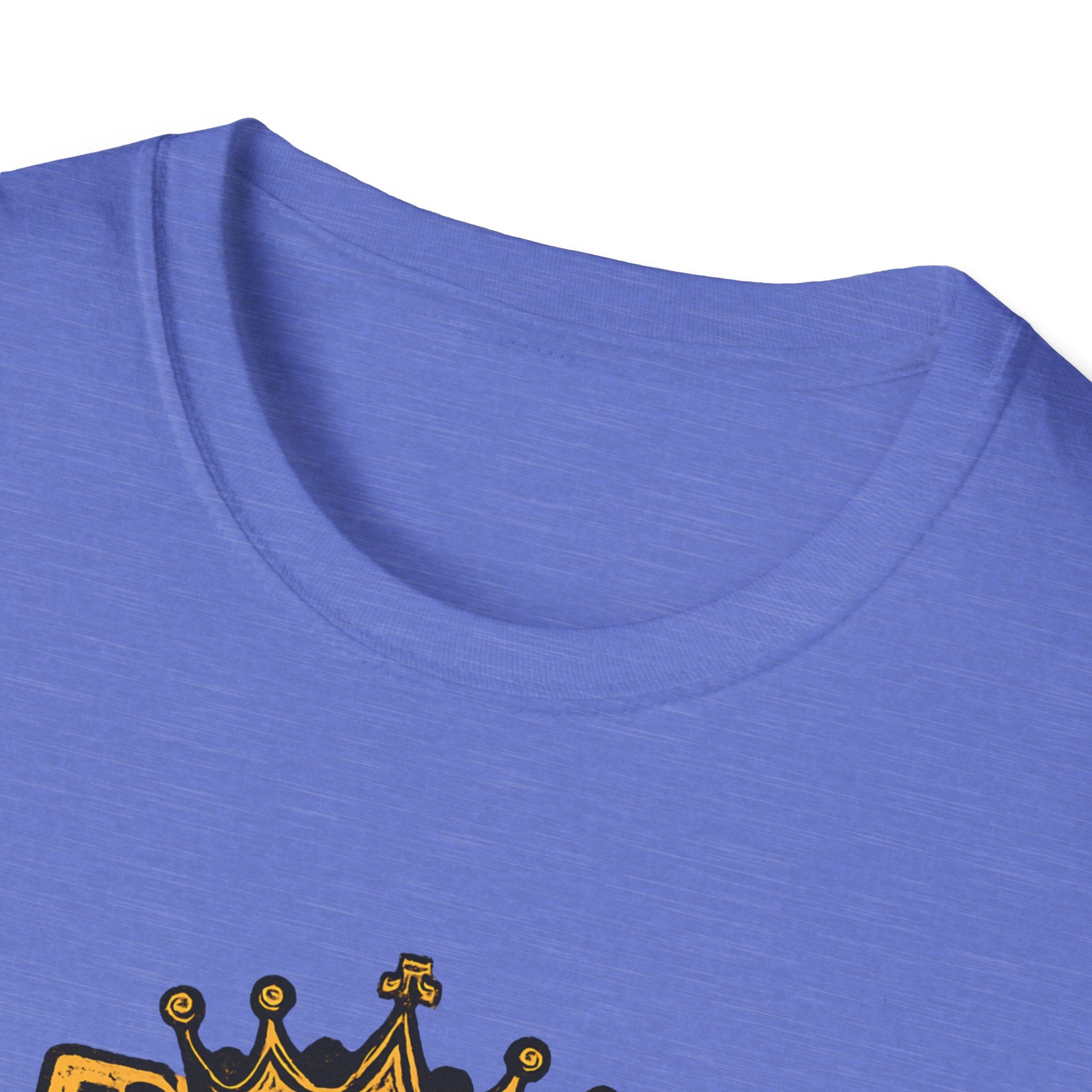 Close-up of a blue shirt with a crown design on a white background