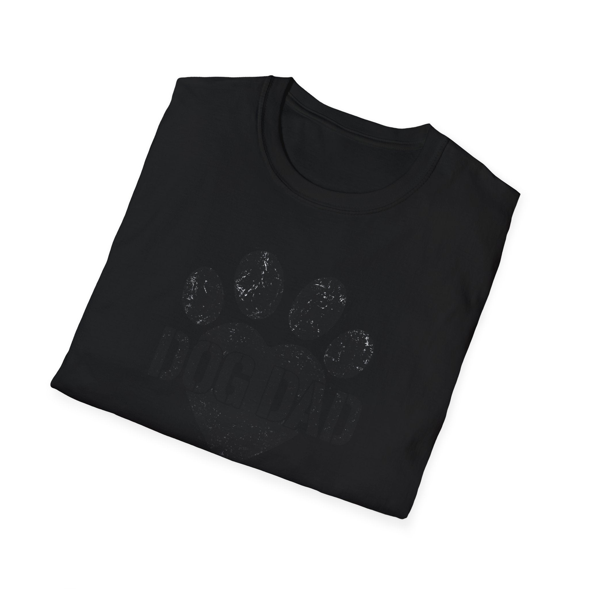 Folded black t-shirt with paw print design on a white background