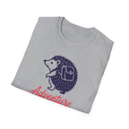 Folded gray t-shirt with a purple hedgehog and red 'Adventure' text on a white background